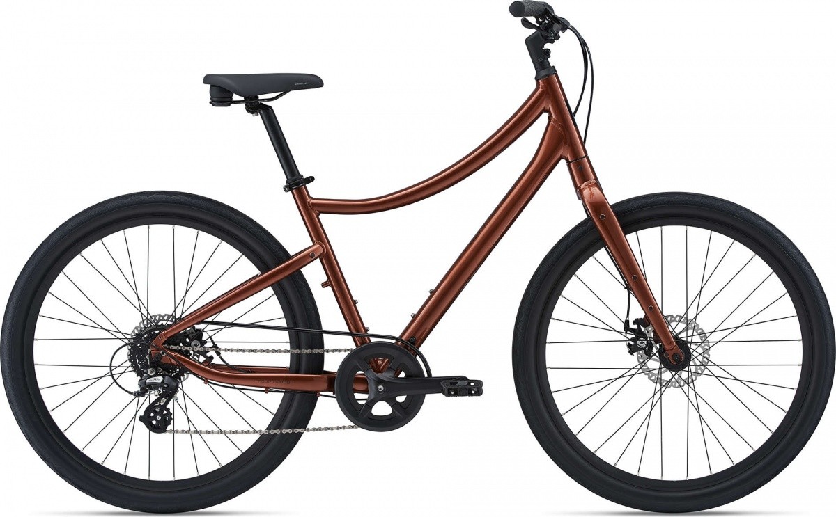 Фото выбрать и купить городской или дорожный велосипед для города и велопрогулок со склада в СПб - большой выбор для взрослого и для детей, велосипед momentum vida (2021) медный, размер l велосипеды в наличии - интернет-магазин Мастерская Тимура